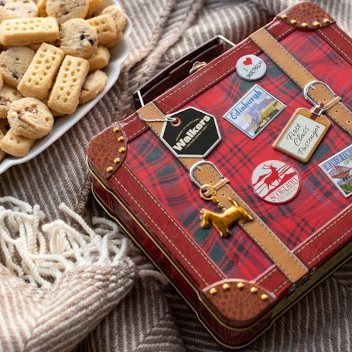 Walkers Shortbread Suitcase Keepsake Tin featuring buttery Scottish shortbread and a classic suitcase design