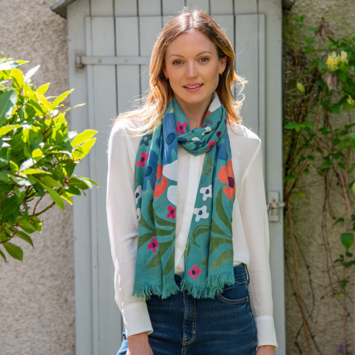 Floral Scarf made from 100% viscose in vibrant colours, draped elegantly