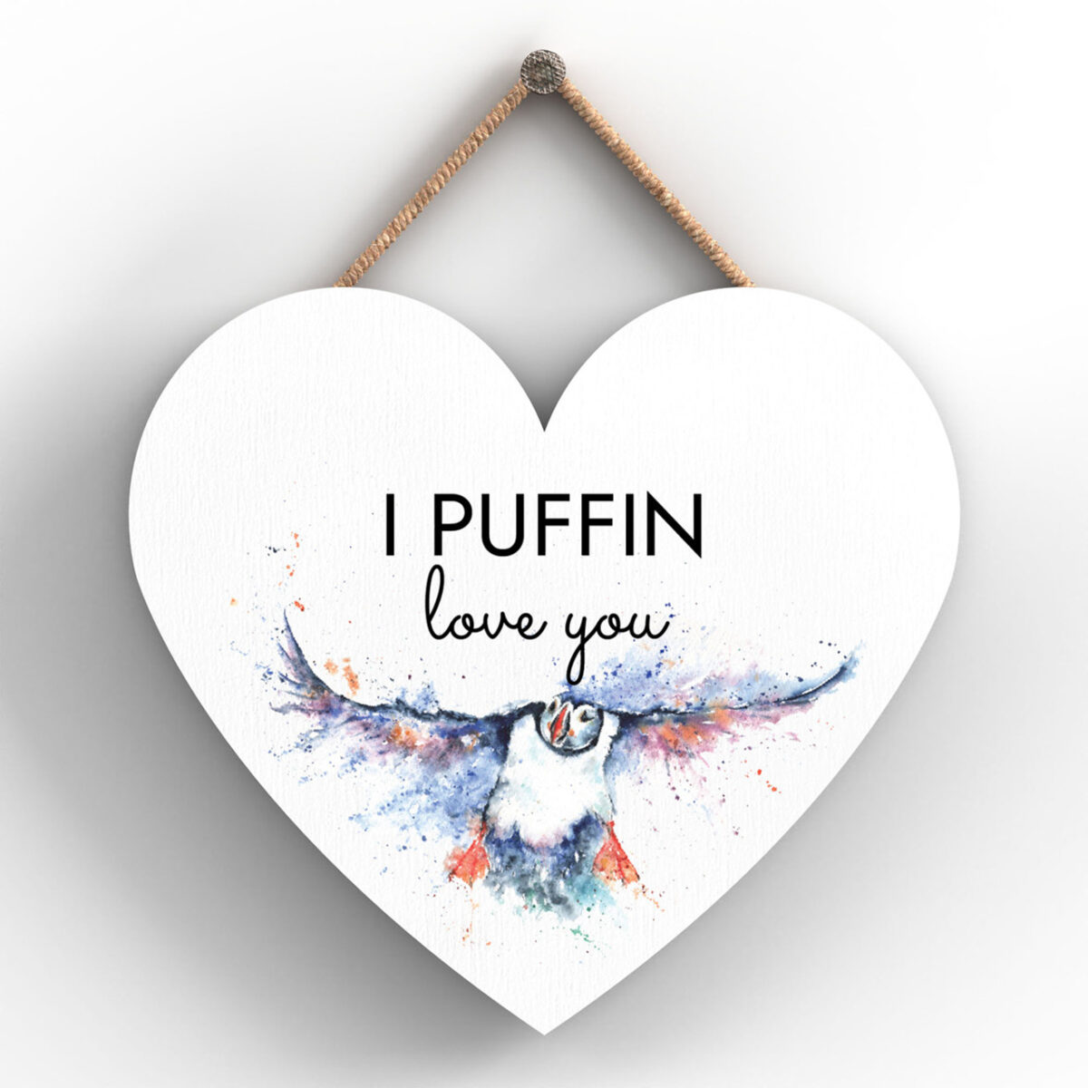 Heart-shaped wooden plaque with puffin in flight and “I PUFFIN love you” message