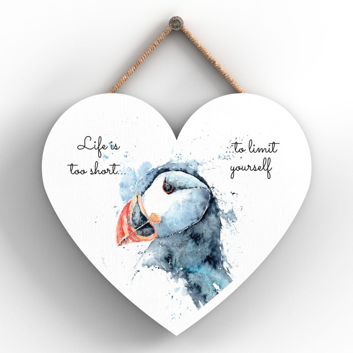 Heart-shaped plaque with puffin illustration and “Life is too short to limit yourself” message