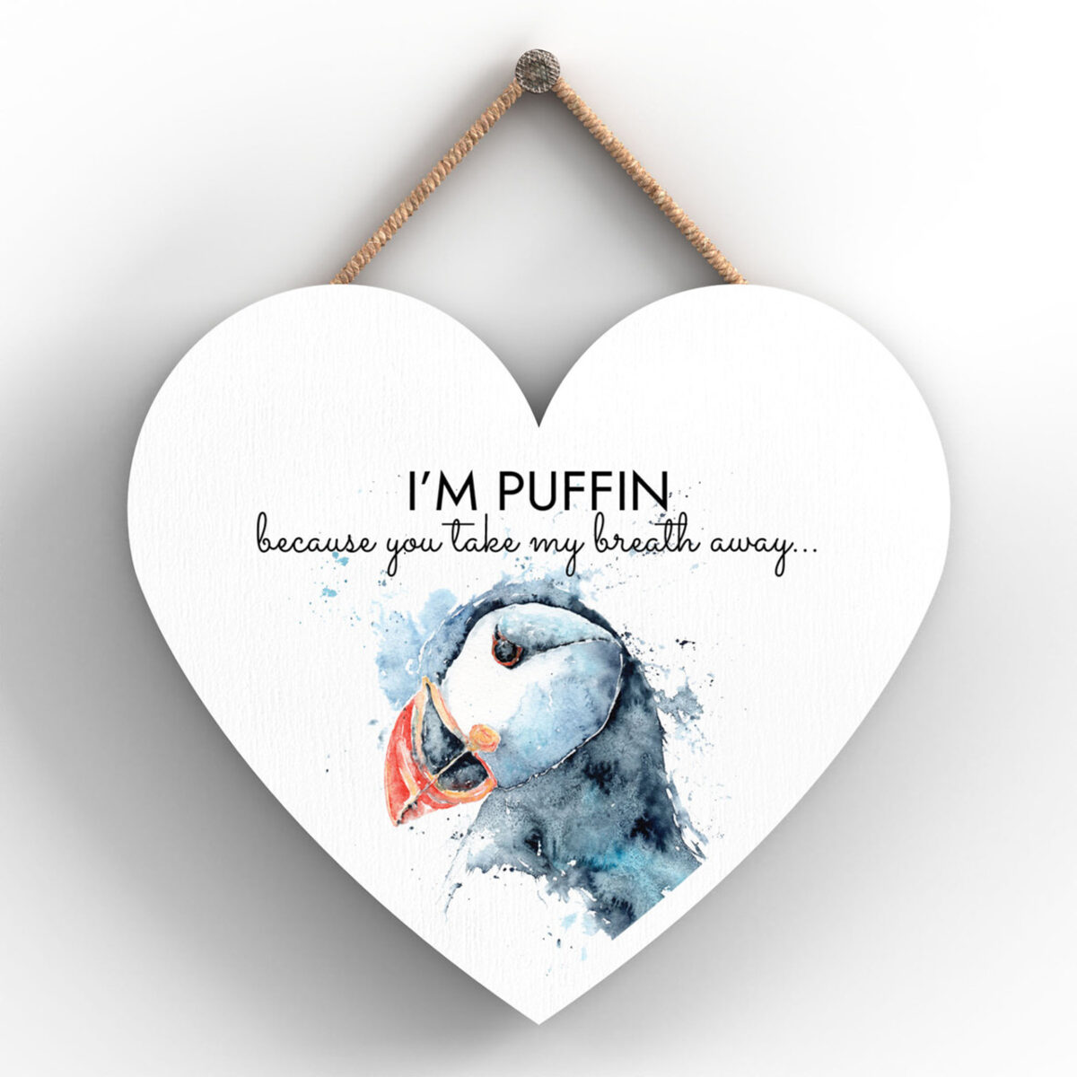 Heart-shaped wooden plaque with puffin illustration and “I'm Puffin, Because You Take My Breath Away...” message